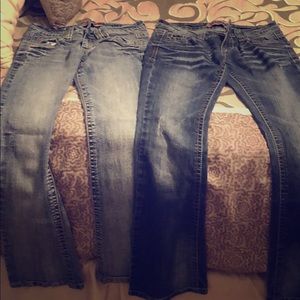 Two pairs of WF jeans. Size 3.